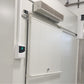 Cold storage room door installed with white EPS sandwich panels for thermal insulation