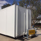 Mobile cold storage unit constructed with EPS sandwich panels, mounted on oversized transport frame